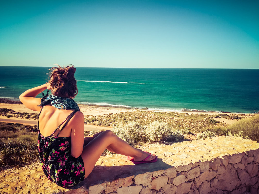 Picture of a woman overlooking the sea in Western Australia