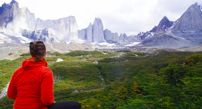 Woman overlooking El Chalten in Patagonia